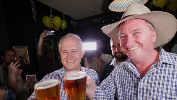 Prime Minister Malcolm Turnbull and Deputy Prime Minister celebrate on the night of the December 2 byelection.