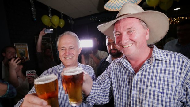 Prime Minister Malcolm Turnbull and Deputy Prime Minister celebrate on the night of the December 2 byelection.