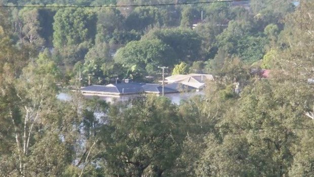 Lynette Lynch's Fernvale home at the height of the 2011 flood.