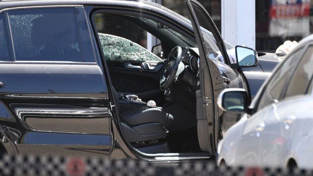 A bullet hole in the window of the Mercedes-Benz SUV in which Mick Hawi was shot.