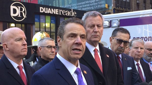 New York Governor Andrew Cuomo in the foreground.