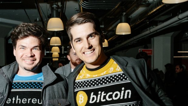 Crypto mania: Fans wearing bitcoin- and Ethereum-themed crypto jumpers.