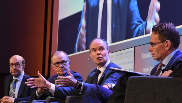 Magellan Financial CEO Hamish Douglass, centre, called for a radical reform of corporate taxes.