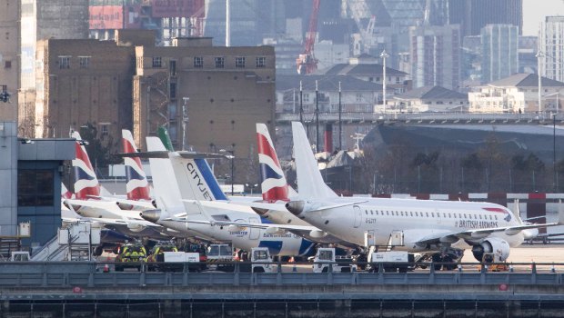 Passenger aircraft sit grounded on the tarmac at London City Airport, following the discovery of an unexploded bomb, in London, UK.