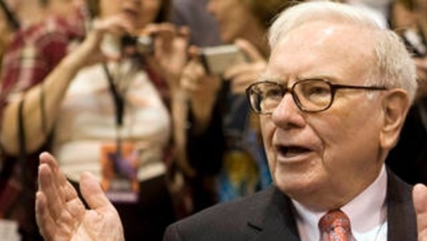 Long a skeptic, Warren Buffett is now backing the iPhone empire.