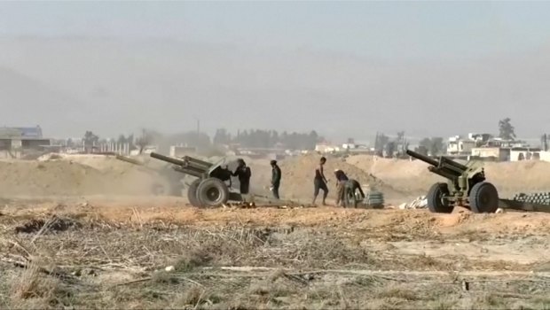 Syrian ground troops aim at Eastern Ghouta on Monday.