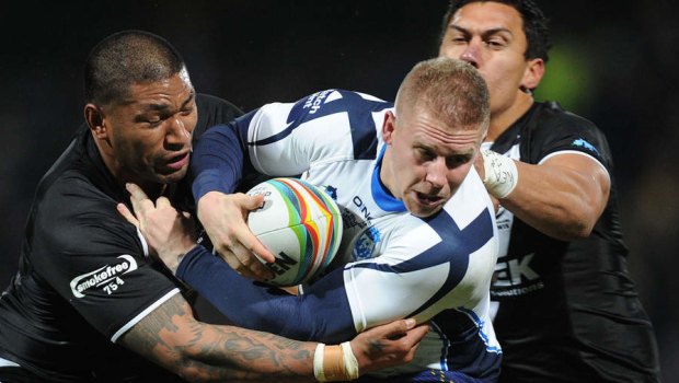 Back to the Roosters: Frank-Paul Nu'uausala (left)in action for New Zealand.