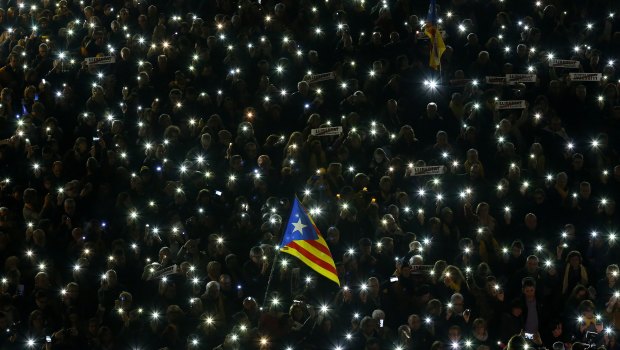 Demonstrators gather during a protest in support of Catalan politicians imprisoned at the Sant Jaume square in Barcelona, Spain. 