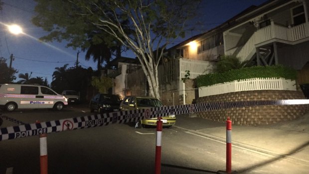 A crime scene has been established at the Woolloongabba home where a man was shot in the leg.