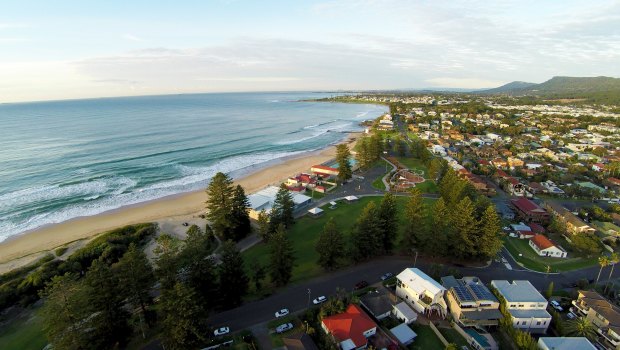 Thirroul beach, looking south towards Wollongong, faces climate change threats, the council says.