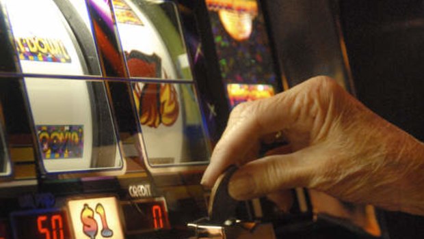 Queenslanders lose more than $4000 on the pokies every minute.