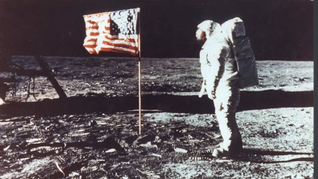 Neil Armstrong walks on the moon. 