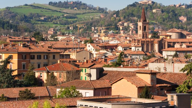 Ancient architecture and rich pasta aren't the only drawcards luring the wealthy to Italian towns such as Bologna.