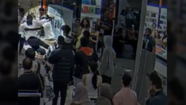 CCTV stills of the teen kicking the police officer at Highpoint Shopping Centre.