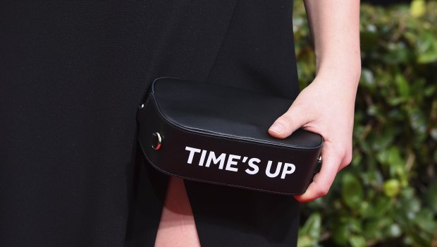 Celebrities at the Golden Globe Awards called "time's up" on sexual abusers this year by wearing black.