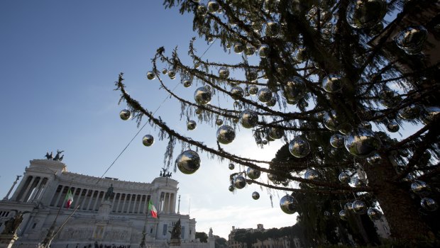 Despite the tree's 600 silver-coloured balls, the half-bare branches lend the square a forlorn rather than festive look.