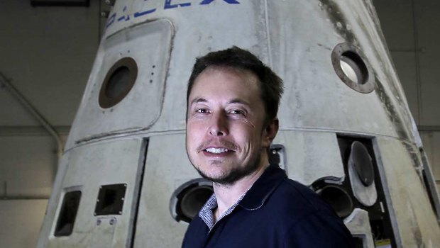 CEO Elon Musk with the SpaceX Dragon capsule.
