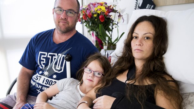 Hit-run victim Michelle Nash with her husband Brad and daughter Chelsea at a Melbourne rehabilitation hospital.