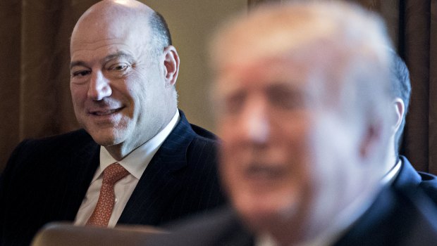 Gary Cohn, outgoing director of the US National Economic Council, listens to Trump, on Thursday.