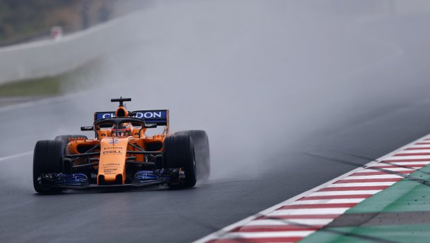 Nod to the past: McLaren's garish new colour scheme. 