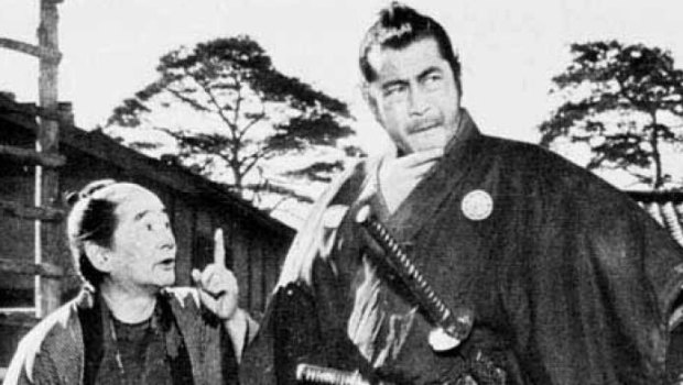 Akira Kurosawa with one of the Seven Samurai. (Not pictured: the other six samurai) 
