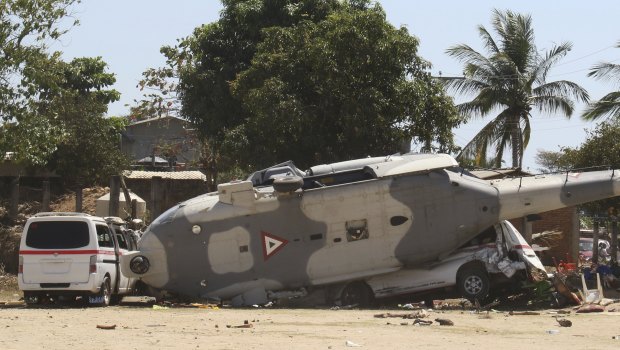 The helicopter crashed onto several vehicles packed with survivors.