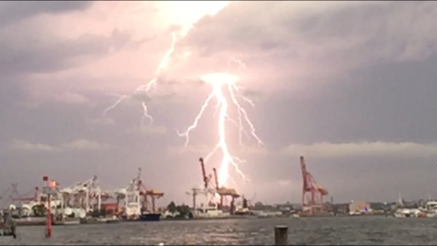 The storm hits Melbourne, looking out from under the West Gate Bridge.