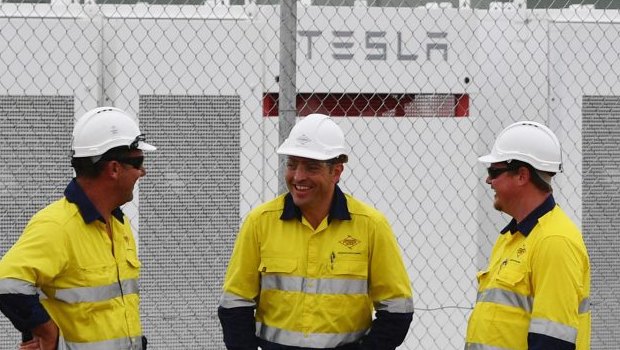 Construction workers at the launch of Tesla's 100 megawatt lithium-ion battery at Jamestown, north of Adelaide. 