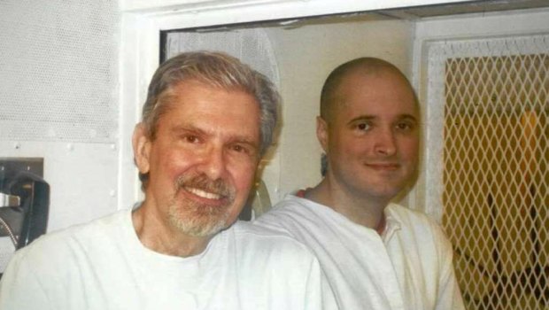 Thomas 'Bart' Whitaker, pictured with his father Kent Whitaker (left) during a 2016 prison visit, was spared the death penalty.