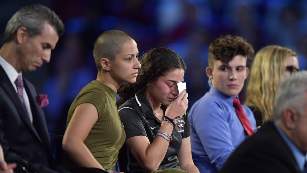 Emma Gonzales, left, comforts a school friend.