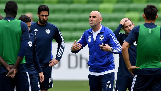 Kevin Muscat instructs the Victory players ahead of their Champions League match.