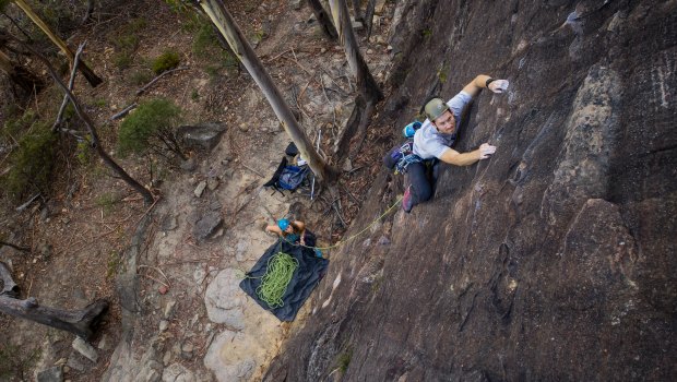 David Ralphs climbs The Bandoline Grip on the Upper Shipley crag in Blackheath while his wife Bronwyn belays. 