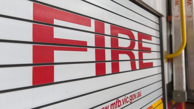A Queensland fire inspector has been suspended from the service after he was charged with official corruption.