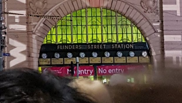 An anti-Adani projection over Flinders Street station.