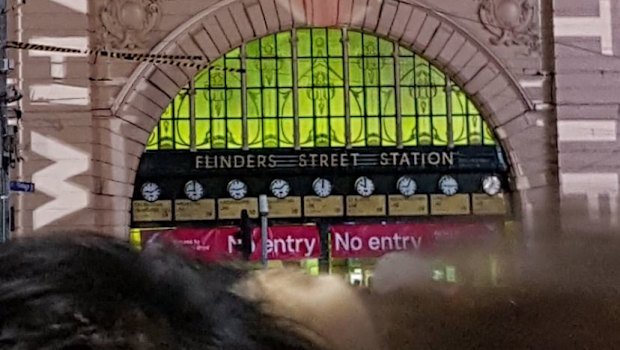 An anti-Adani projection over Flinders Street station.