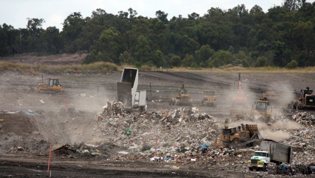 Queensland waste trucks dump unprocessed construction waste from NSW at Cleanaway's New Chum landfill in Ipswich.