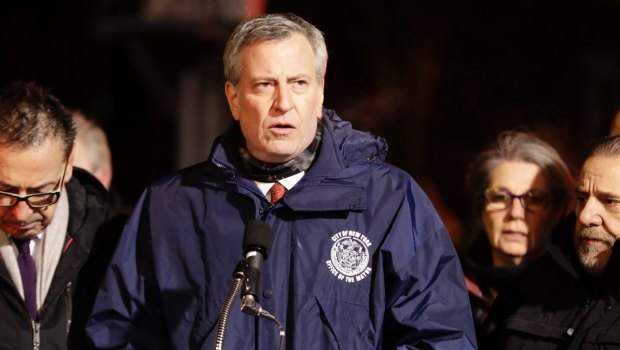 New York City Mayor Bill de Blasio said law enforcement officials "likely saved many, many lives," in making the arrests.