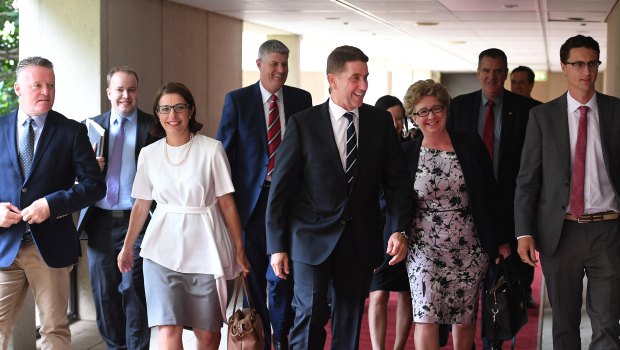 New and old Labor MPs walk into the first caucus meeting following the Queensland election.