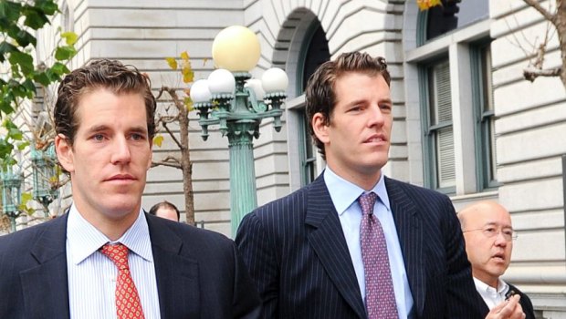 Cameron Winklevoss, left, and his twin brother Tyler are big believers in bitcoin.