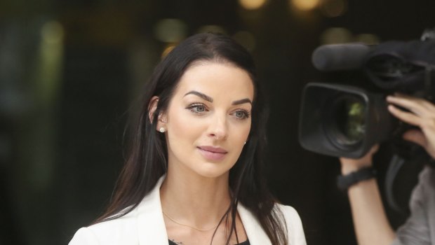 Channel Seven reporter Laura Banks leaves the Downing Centre Local Court in Sydney on Monday.