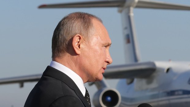 Russian President Vladimir Putin addresses the troops at the Hemeimeem air base in Syria in December 2017.