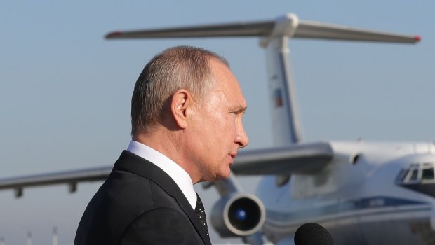 Russian President Vladimir Putin addresses the troops at the Hemeimeem air base in Syria in December 2017.