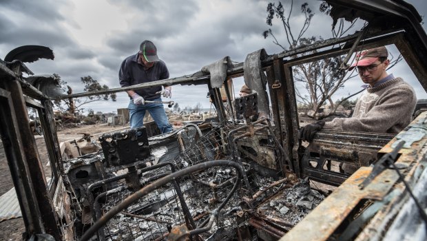 Farming families returned to their burnt out homes on Monday. 