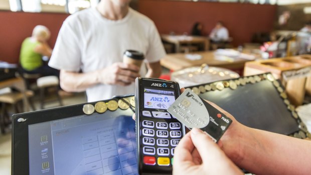 Banks are under pressure to give merchants a lower-cost way of processing tap-and-go debit card payments.