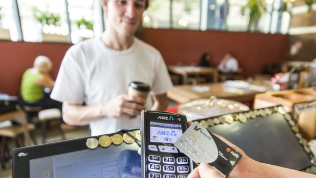 Banks are under pressure to give merchants a lower-cost way of processing tap-and-go debit card payments.