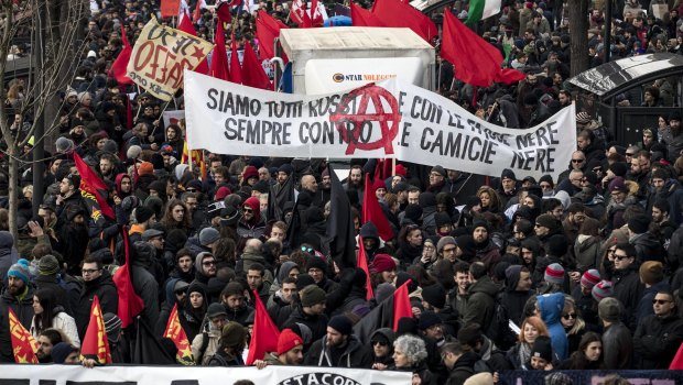People take to the streets to participate in an anti-racism march following last Saturday’s attacks in the Italian city of Macerata.