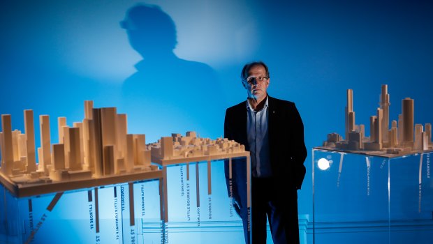 Rob Adams with architectural models of Melbourne produced for his new exhibition on the city. 