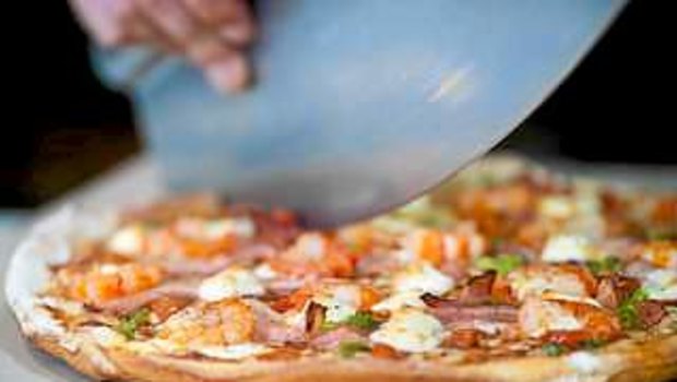 Domino's Pizza has revised down its sales expectations. 