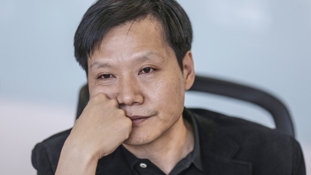 Billionaire Lei Jun, CEO of Xiaomi, cooks for the firm's biggest fans at an annual banquet.