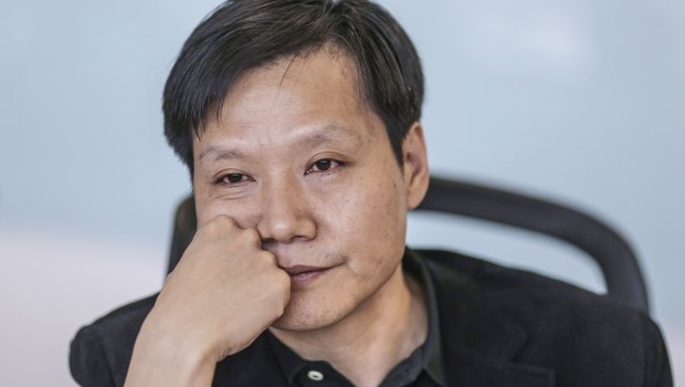 Billionaire Lei Jun, CEO of Xiaomi, cooks for the firm's biggest fans at an annual banquet.